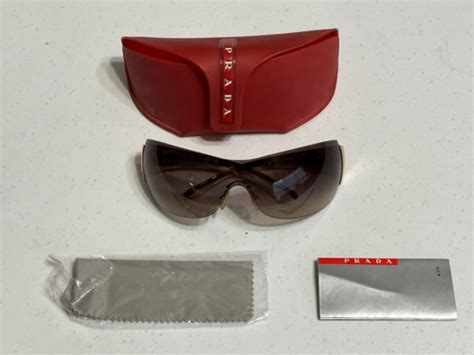 Prada Rimless Sunglasses SPR 54G Brown .